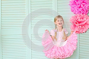 girl with pigtails, wearing a skirt tutu