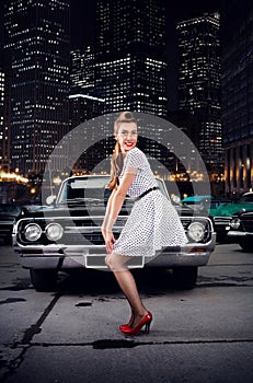 Girl pin-up, retro car, night city