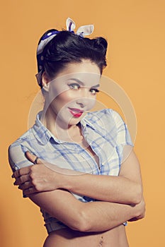 Girl in pin-up style hugging his hands