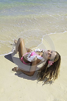 Girl in pink bikini at the beach