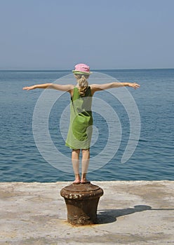 Girl in pink cap ready for fly