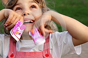 Girl with pink shoes for animals