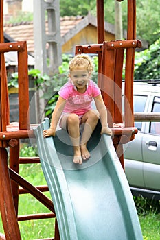 Girl in pink on slide