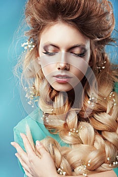 Girl with Plait and Intertwined Flowers photo