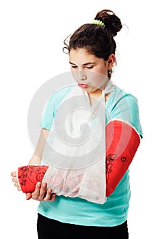 Girl with plaster cast pouting