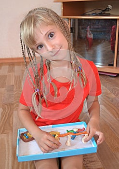 Girl and Plastilin