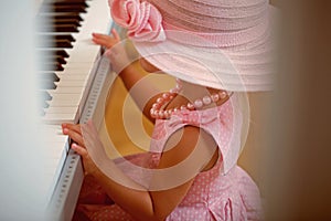 Girl play digital piano