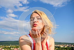 Girl playful mood coquette. Ultimate art of seduction. Girl blonde lady smiling enjoy freedom and fresh wind blue sky