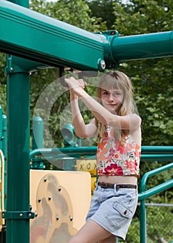 Girl on Playground Equipment