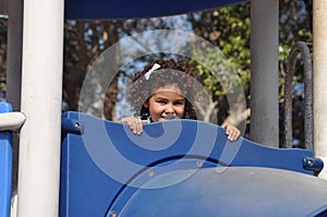 Girl in a playground photo