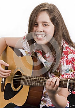 Girl playing acoustic guitar