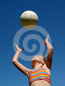 Girl playing with ball