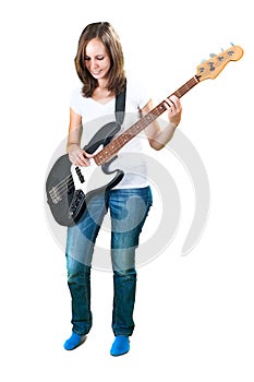 Girl playing bass guitar isolated on white