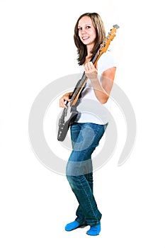 Girl playing bass guitar isolated on white