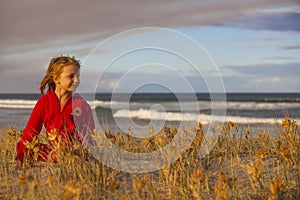 Girl playing on beach