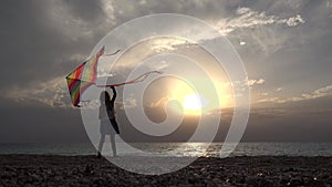 Girl Playing on Beach on Seashore, Kid Flying Kite at Sunset on Ocean, Child on Coastline in Summer Vacation Sea Waves at Sundown