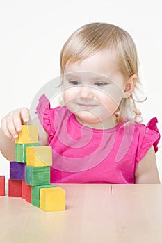 Girl playing with bricks