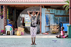 Girl Playing in Castries Market, Saint Lucia