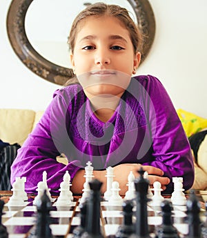 Girl playing chess