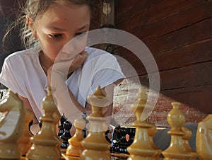 Girl playing chess