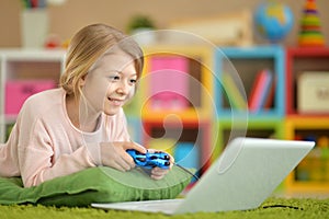 Girl is playing a computer game