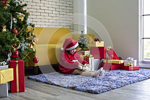 Girl playing doll. X-mas and holiday concept. Happy childen girl