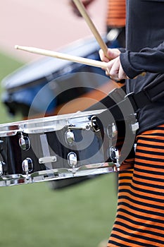 Girl playing the drum