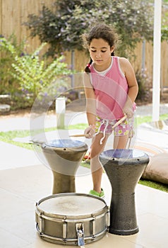 Girl playing drums