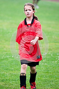 Girl playing football