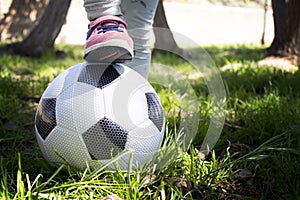 GIRL PLAYING FOOTBALL