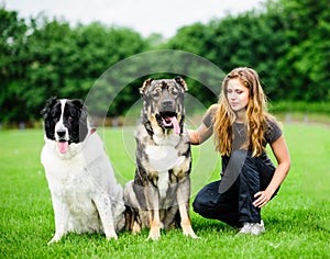 girl playing with funny dog