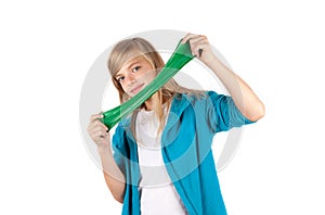 Girl playing with green slime. Isolated on white background.