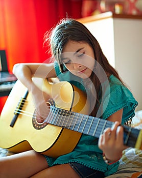 Girl playing guitar