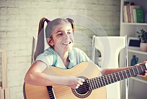 Girl playing guitar