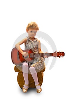 Girl playing guitar, thoughtful face