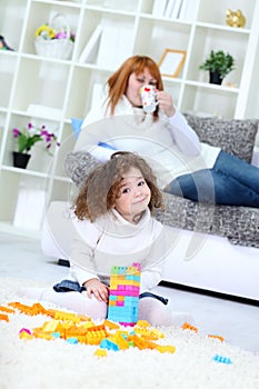 Girl playing with her toys