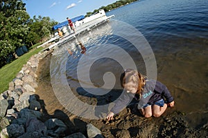 Girl Playing Lakeside