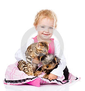 Girl playing with pets - dog and cat. looking at camera