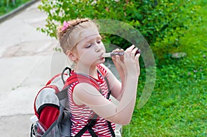 Girl playing a pipe