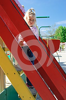 Girl playing on the play ground