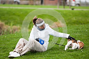 Girl playing with puppy