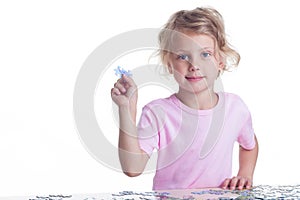 Girl playing puzzles