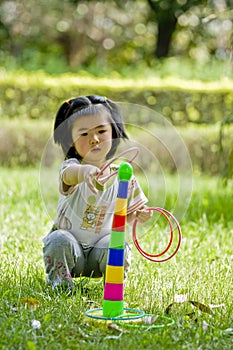 Girl playing quoits