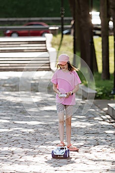 Girl playing with remote control car