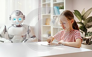 girl is playing with a robot