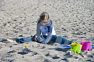 Girl playing in sand