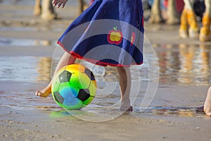 Girl playing scoccer or footaball