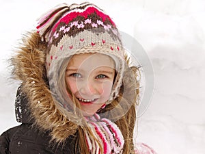 Girl playing in the snow