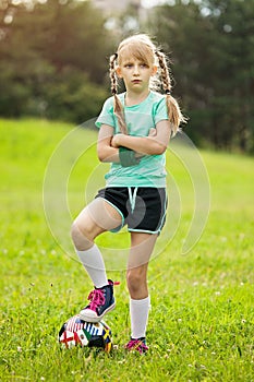 Girl playing soccer