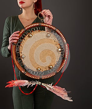 Girl playing the tambourine